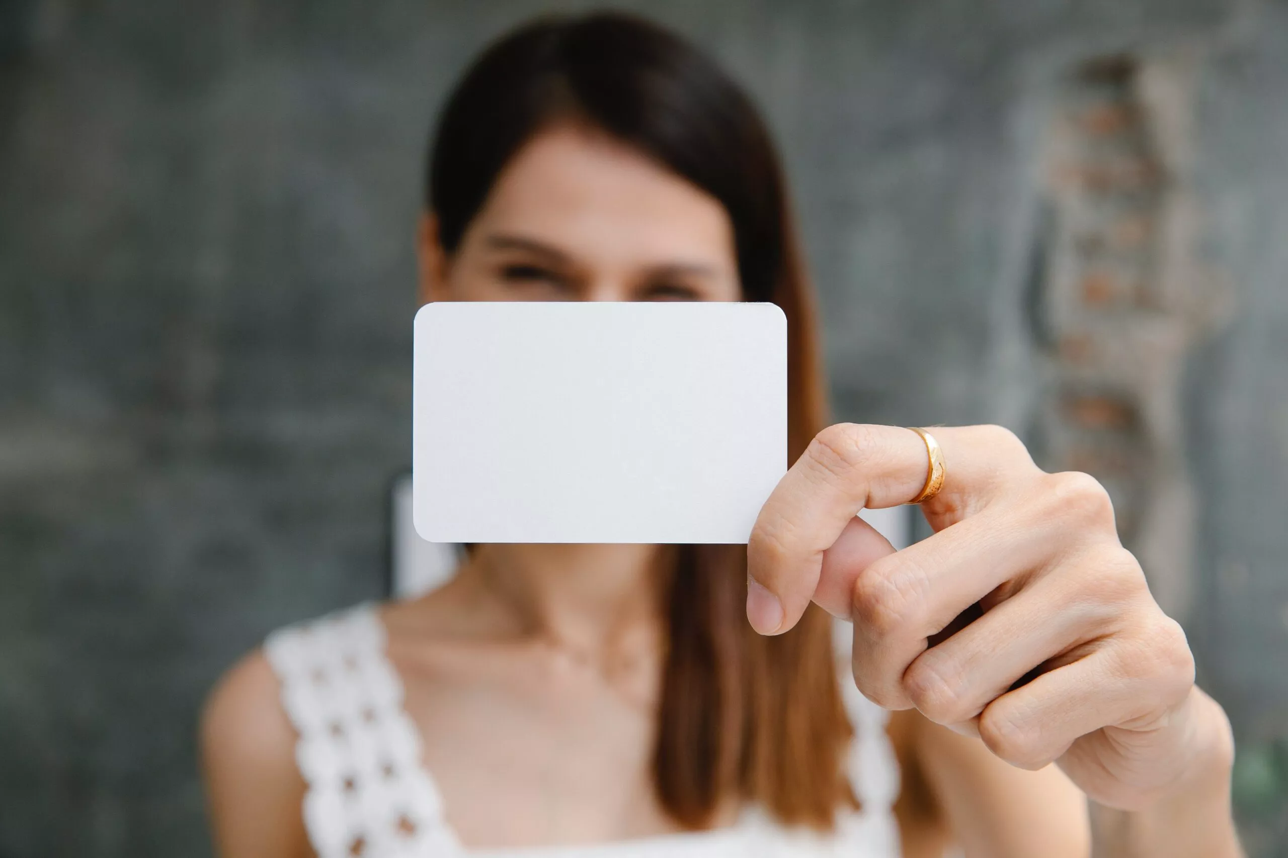 woman with blank business card